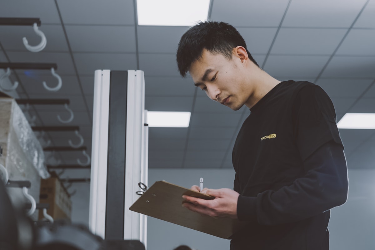 Engineer reviewing an energy audit checklist on a clipboard
